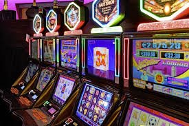 The Dog House slot game interface on teken mobile app showing reels and paytable